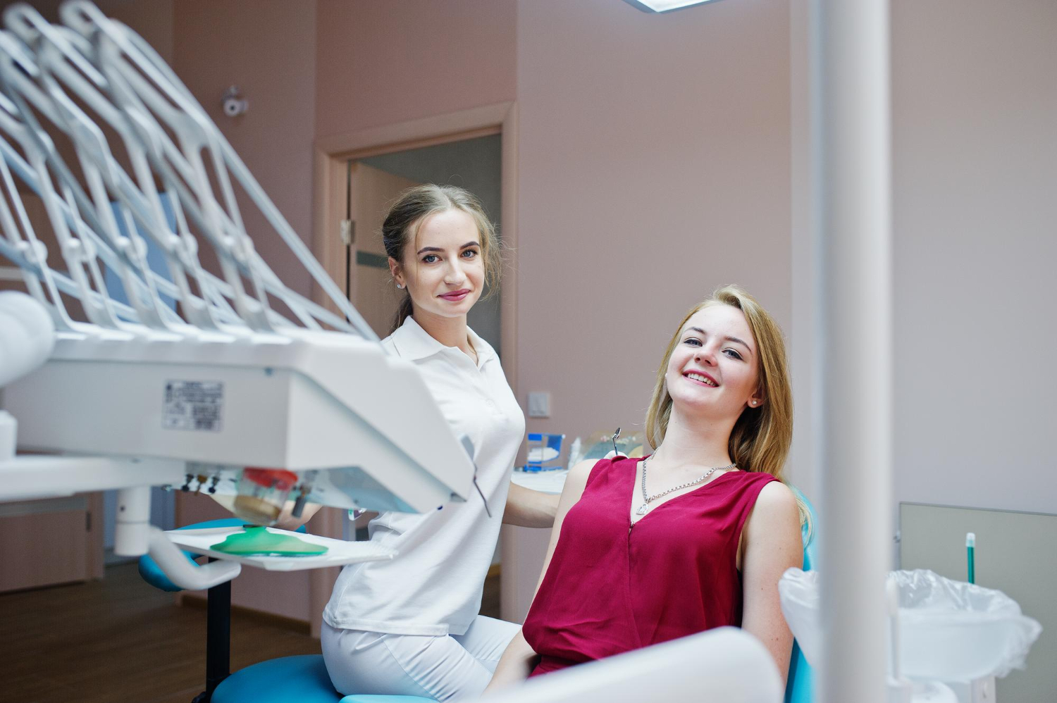 Tooth extraction consultation with a dentist and patient discussing comfort during a dental visit in North Wales, PA.